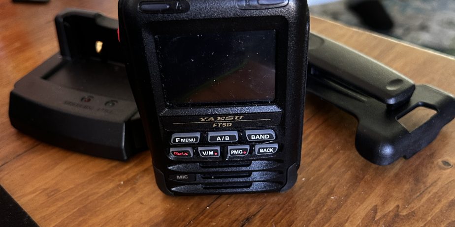 PENDING!! Yaesu FT5D with Rapid charging dock AND SCU-57 cable kit.